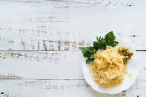 Free photo top view delicious pasta dish on white table