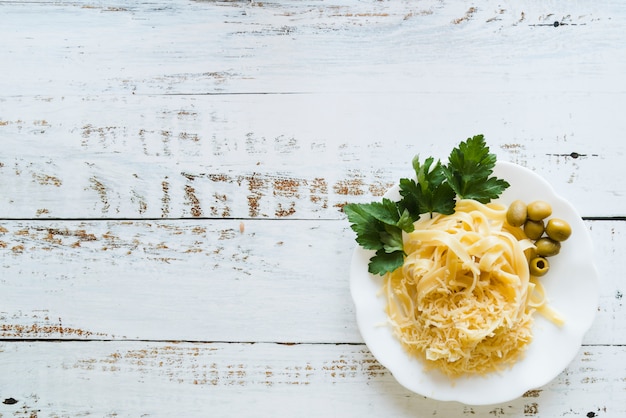 Free Photo top view delicious pasta dish on white table