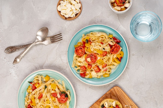 Top view of delicious pasta on plain background