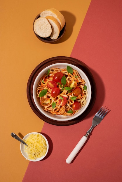 Top view delicious pasta with tomatoes