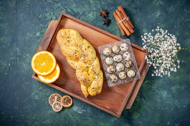 Free Photo top view delicious pastry with quail eggs on dark blue surface