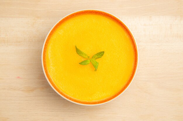 Top view of delicious pumpkin soup in a bowl