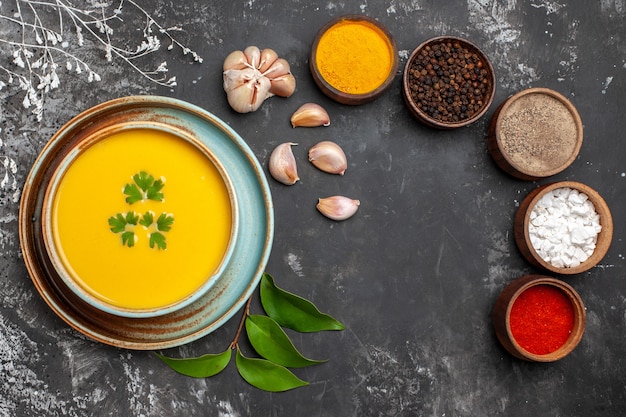 Free photo top view of delicious pumpkin soup in a bowl