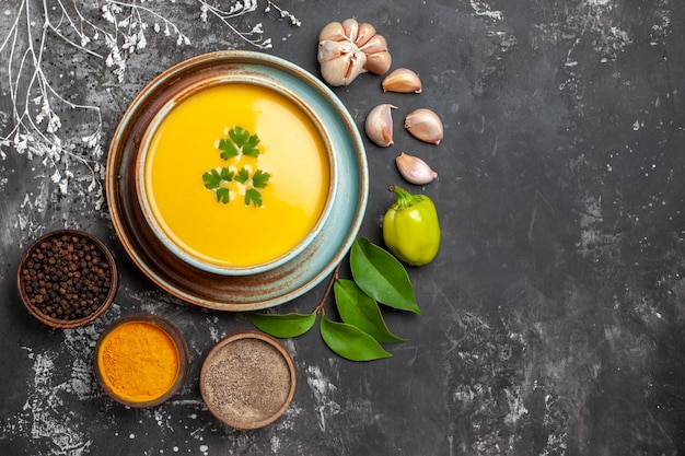 Free photo top view of delicious pumpkin soup in a bowl