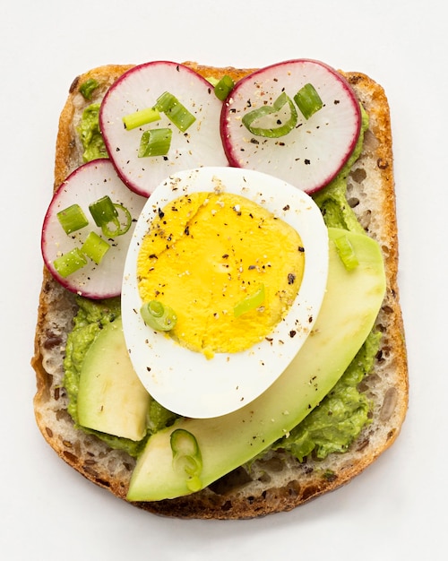 Free Photo top view of delicious sandwich with egg and avocado