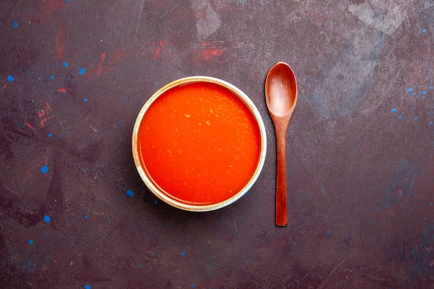 Top view delicious tomato soup cooked from fresh tomatoes on dark background dish sauce meal tomato soup