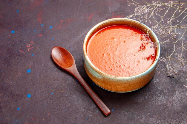 Top view delicious tomato soup cooked from fresh tomatoes on a dark background sauce meal tomato dish soup