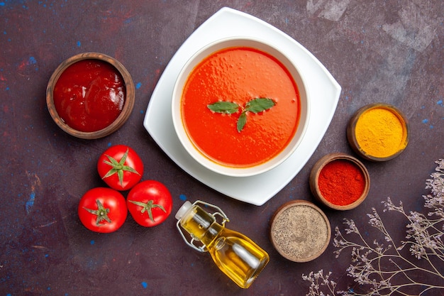 Free Photo top view delicious tomato soup with seasonings on the dark background dish sauce tomato color meal soup