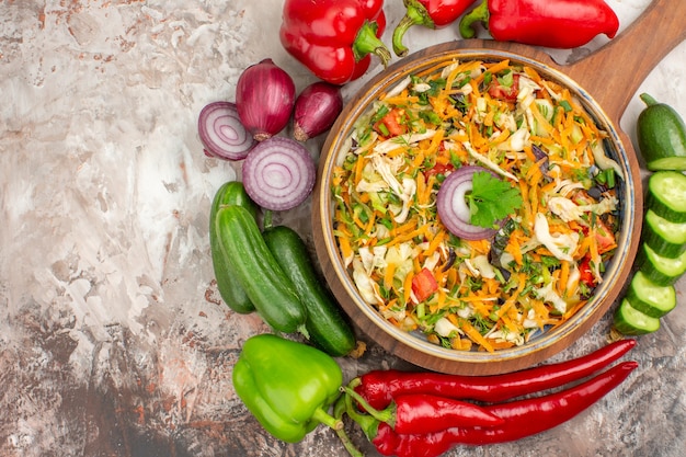 Free photo top view of delicious vegan salad with various vegetables