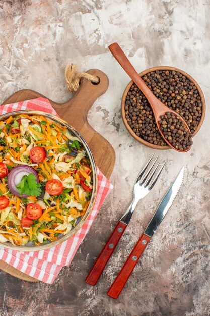 Top view of delicious vegan salad with various vegetables