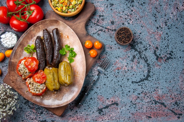 top view delicious vegetable dolma with salad and tomatoes, health food dinner color dish meal cuisine