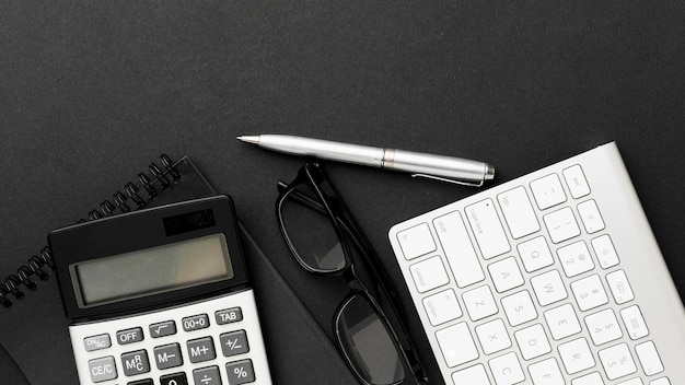 Top view desk concept with calculator