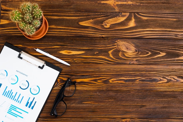 Free photo top view desk concept with a clipboard