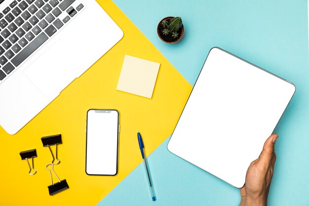 Top view desk concept with mockup devices