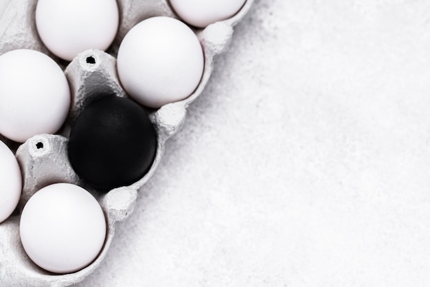 Top view of different colored eggs for black lives matter movement