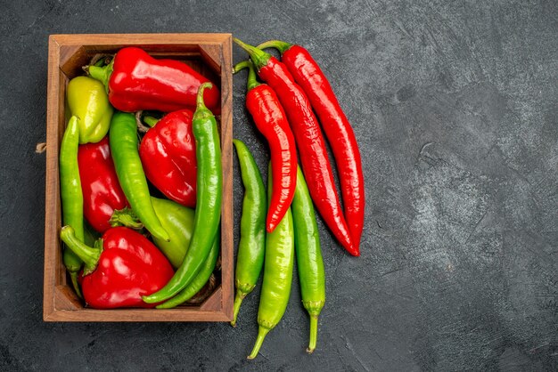 Top view different fresh peppers spicy plants