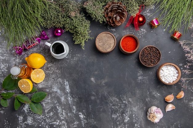 Top view different seasonings with lemon slices