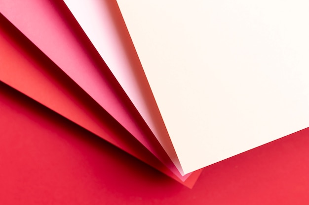 Free photo top view different shades of red papers