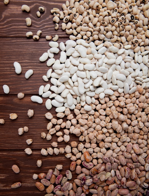 Top view of different types of legumes scattered