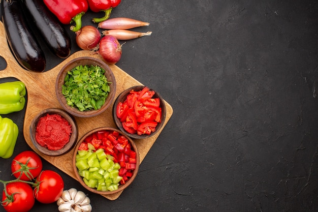 Top view different vegetables fresh and ripe on grey background salad ripe health meal