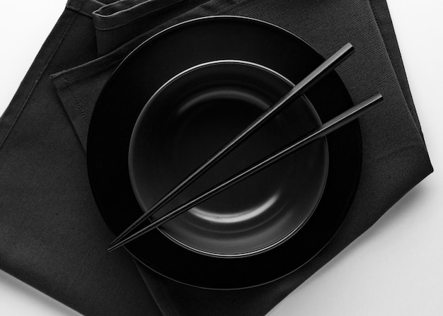 Free photo top view of dinnerware with chopsticks