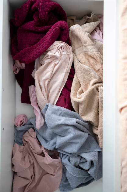 Free photo top view dirty home with messy clothes