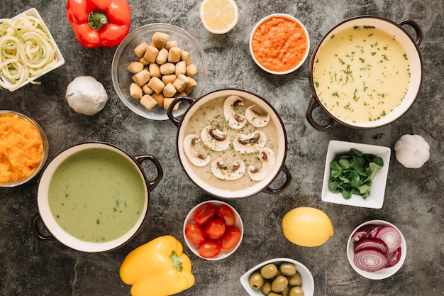 Top view of dishes with mushrooms and soups