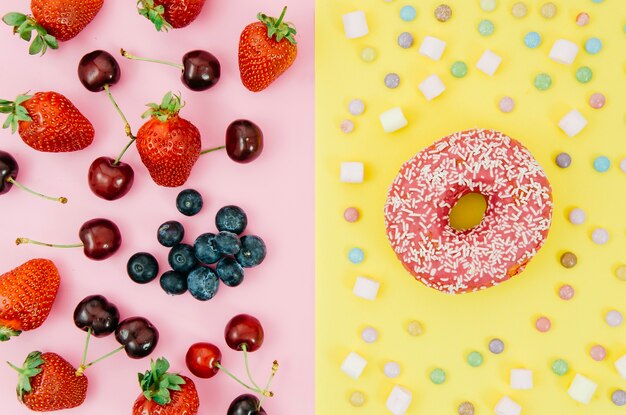 Top view donut vs fruit