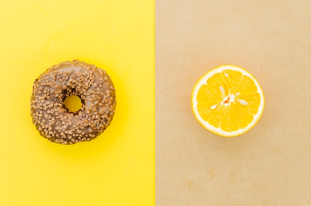 Top view donut vs fruit