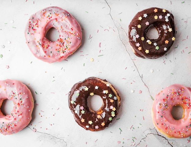 Free photo top view donuts with frosting