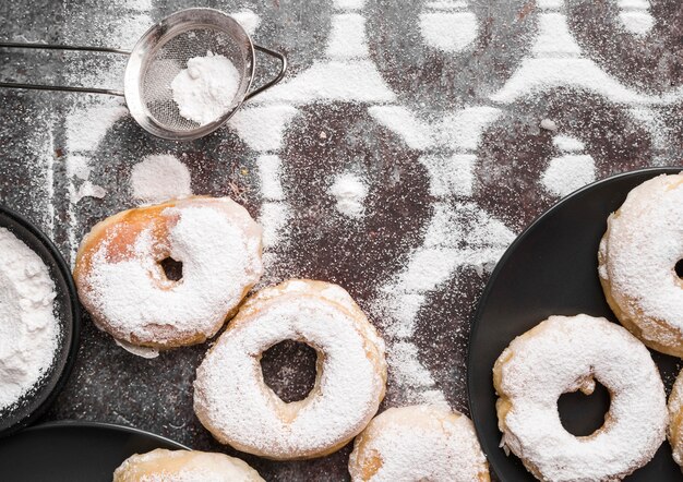 Top view donuts with sugar powder