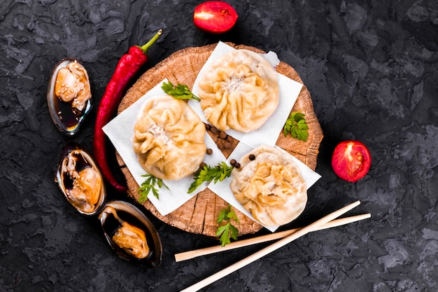 Free photo top view  dumplings on wooden board