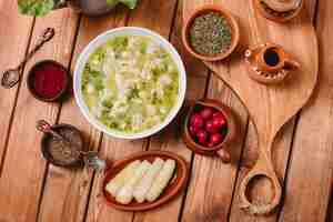 Free photo top view of dushbara dumpling soup served with dried herbs and spices