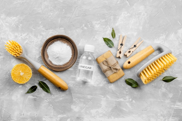 Free photo top view of eco-friendly cleaning products with brushes