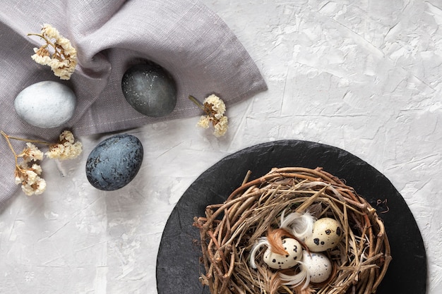 Free photo top view of eggs for easter with bird nest and fabric