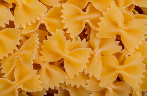 Top view of farfalle pasta background