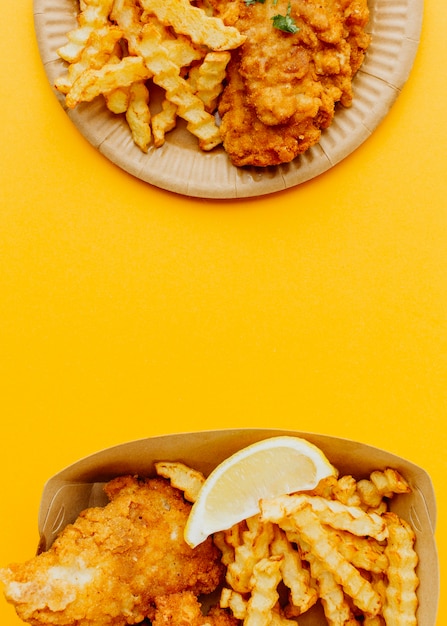 Top view of fish and chips with copy space