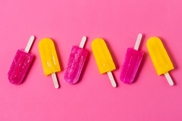 Top view flavored ice cream on sticks