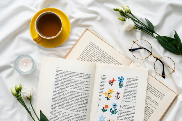 Top view floral bookmark on books