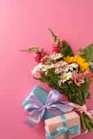 Free photo top view of flowers bouquet with gift