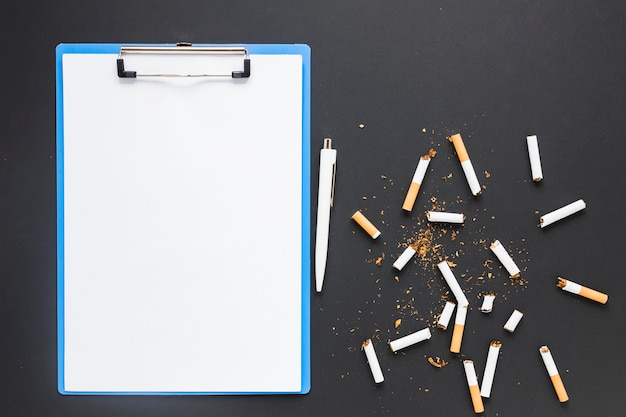 Free photo top view folder with cigarettes