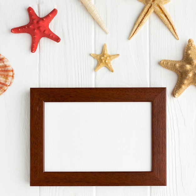 Top view frame surrounded by starfish