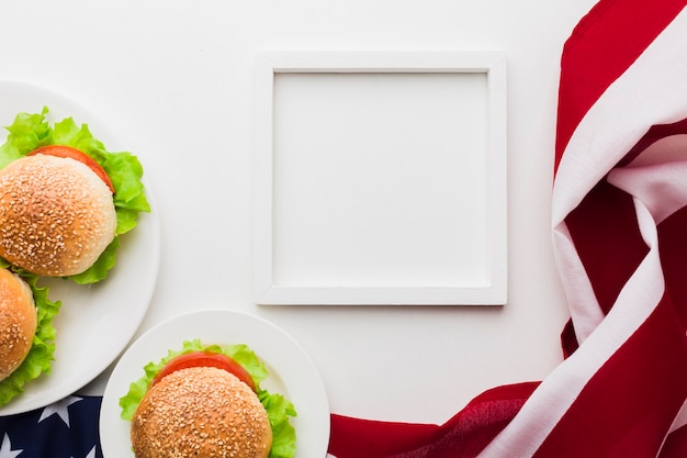 Free photo top view of frame with burgers and american flag