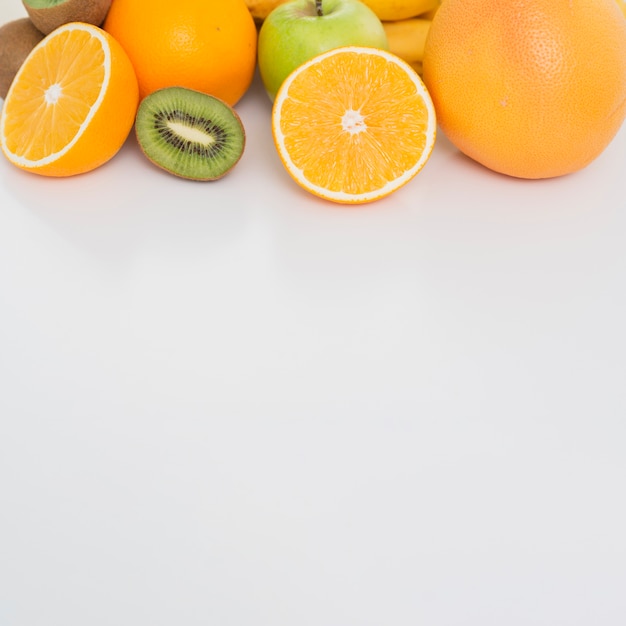 Free Photo top view frame with fruits and copy-space