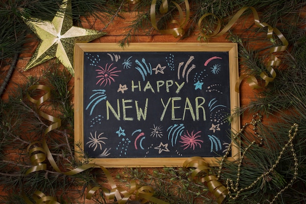 Free photo top view frame with happy new year message