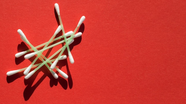 Top view frame with sticks and red background