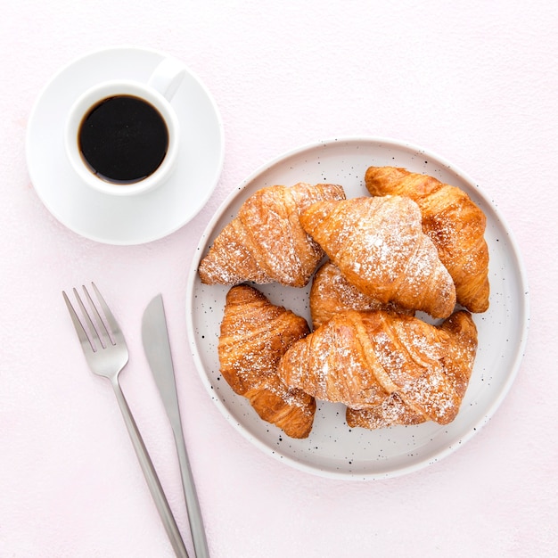 Top view french croissants and coffee