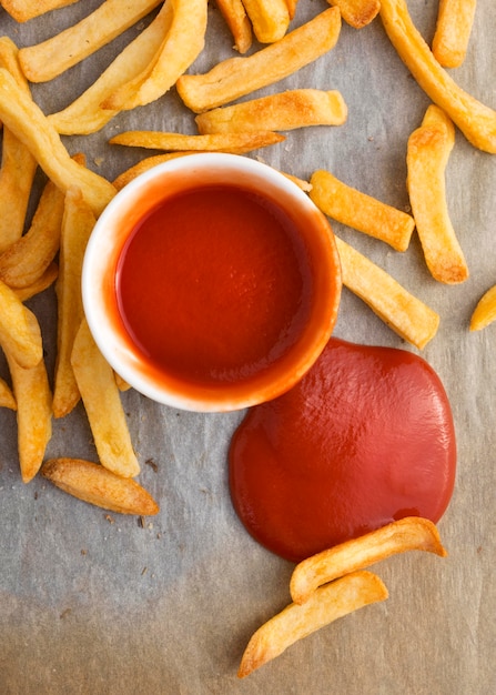 Free Photo top view of french fries with ketchup sauce