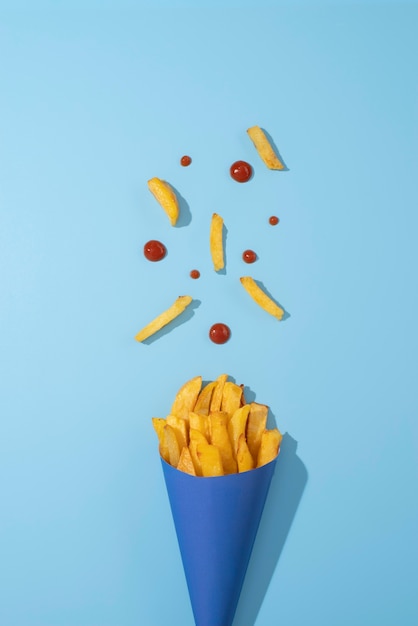 Free photo top view french fries with ketchup