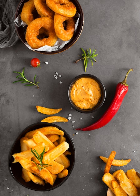 Free Photo top view of french fries with mustard and chili pepper